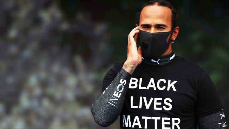 Lewis Hamilton of Great Britain and Mercedes GP is seen wearing a black lives matter t-shirt prior to the Formula One Grand Prix of Hungary at Hungaroring on July 19, 2020 in Budapest, Hungary. (