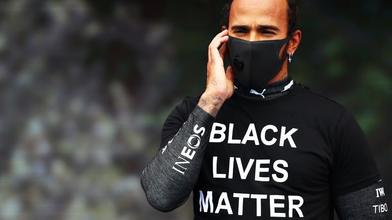 Lewis Hamilton urges more F1 anti-racism action after ...