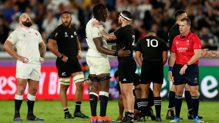 Maro Itoje of England is congratulated by TJ Perenara