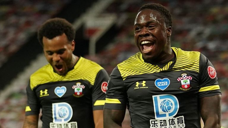 Michael Obafemi celebrates his late equaliser against Manchester United