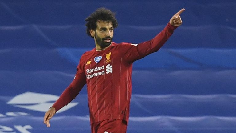 Mohamed Salah of Liverpool celebrates after he scores his side's third goal against Brighton