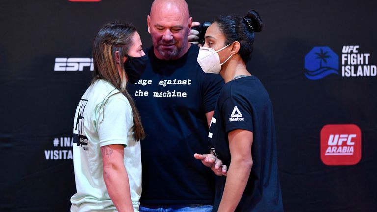 Opponents Molly McCann of England and Taila Santos of Brazil face off during the UFC Fight Night weigh-in