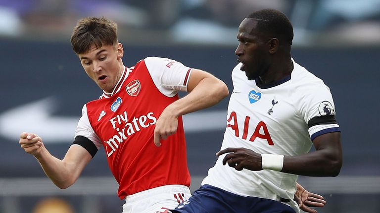Moussa Sissoko and Kieran Tierney challenge for the ball during Arsena's match against Tottenham