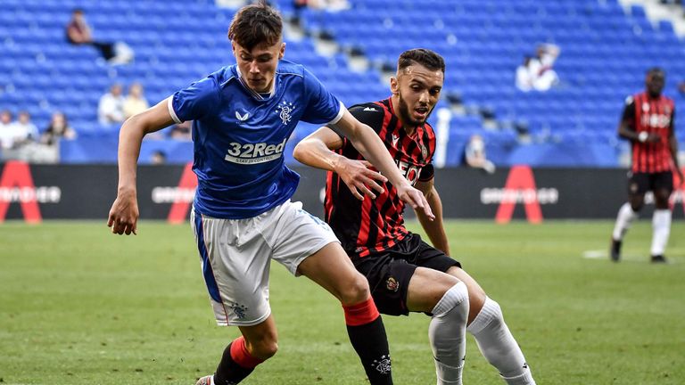 Nathan Patterson (L) battles for the ball with Nice forward Amine Gouiri