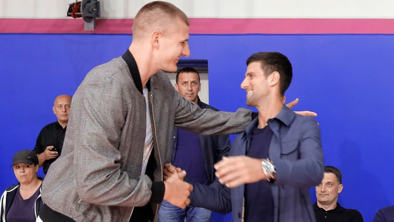Nikola Jokic greets compatriot Novak Djokovic at a basketball event in Serbia