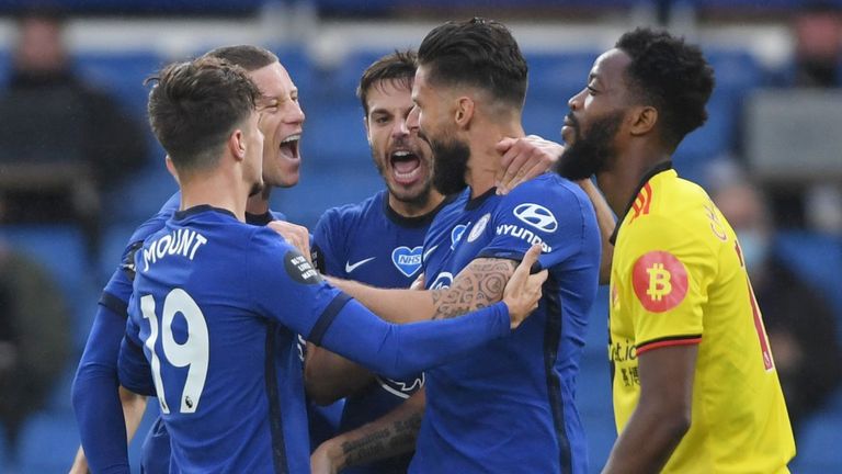Olivier Giroud celebrates with team-mates after giving Chelsea the lead against Watford