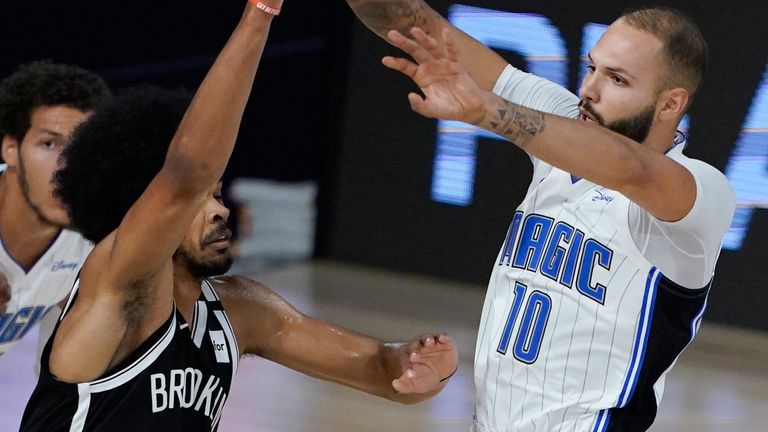 Evan Fournier throws a pass beyond the reach of Jarrett Allen