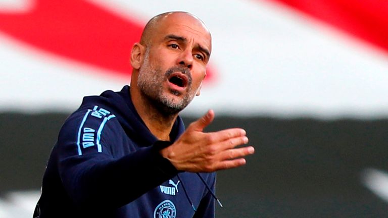 Pep Guardiola cuts a frustrated figure on the sidelines as his City side are beaten