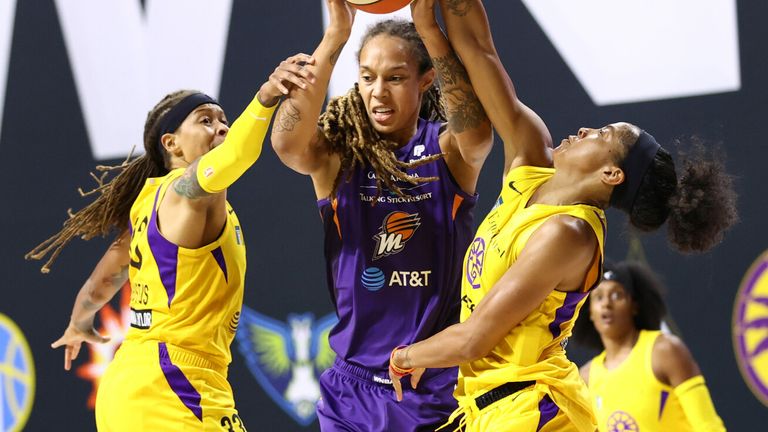 Brittney Griner is double-teamed by Sparks defenders