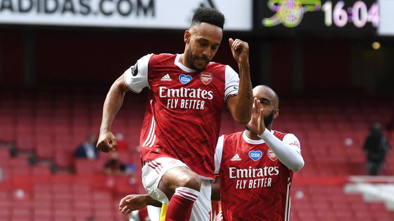 Pierre-Emerick Aubameyang celebrates as Arsenal take an early lead against Watford