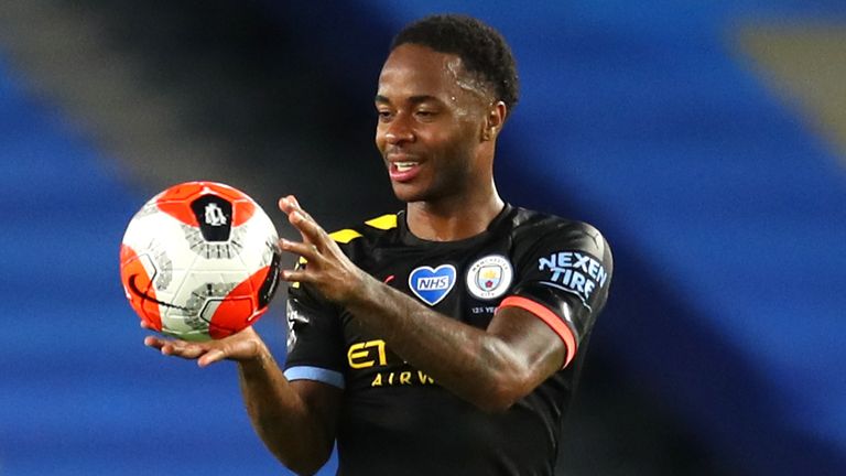 Manchester City's Raheem Sterling with his hat-trick match ball after the final whistle during the Premier League match at the Amex Stadium, Brighton
