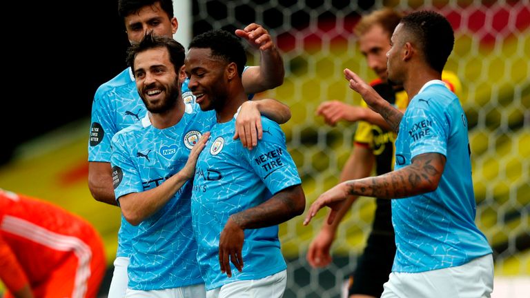 A relieved Sterling celebrates his second after his penalty was saved