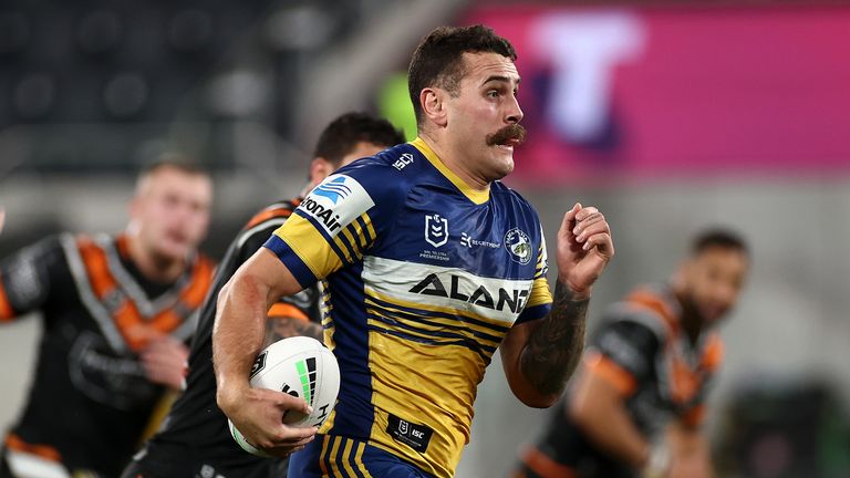 Reagan Campbell-Gillard  makes a break to score  for the Eels