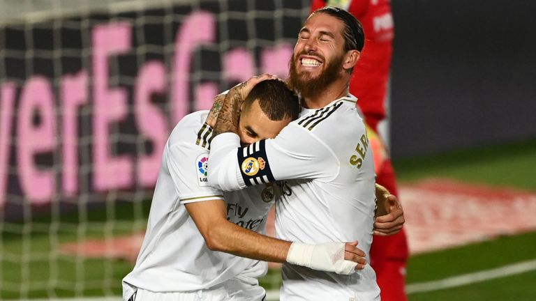 Sergio Ramos hugs Karim Benzema after he scores a penalty for Real Madrid against Villarreal