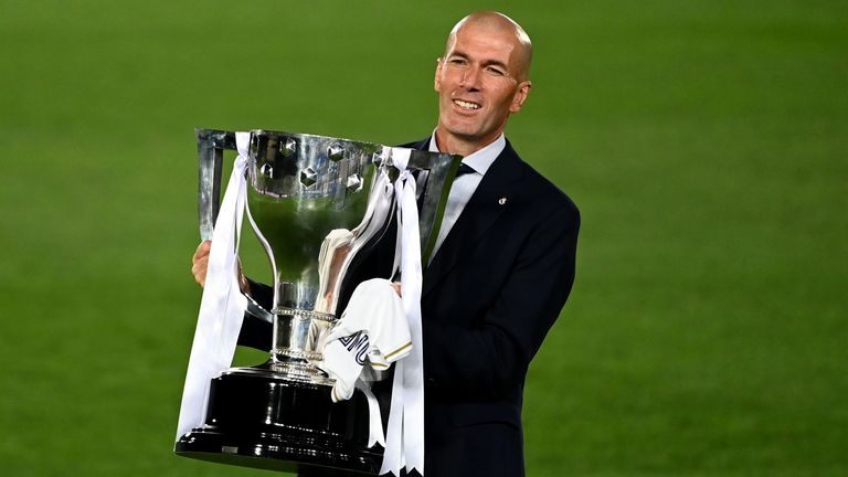 Real Madrid head coach Zinedine Zidane with La Liga trophy