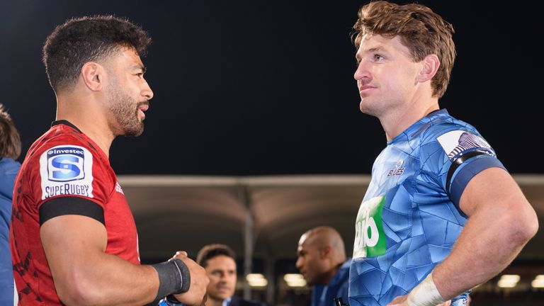 Richie Mo'unga of the Crusaders and Beauden Barrett of the Blues (L-R) chat following the round 5 Super Rugby Aotearoa match between the Crusaders and the Blues at Orangetheory Stadium on July 11, 2020 in Christchurch, New Zealand