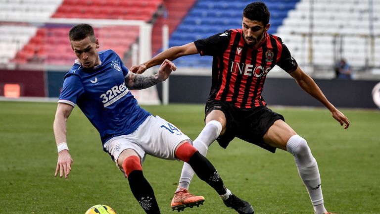 Ryan Kent (L) vies for the ball with Nice midfielder Pierre Lees-Melou