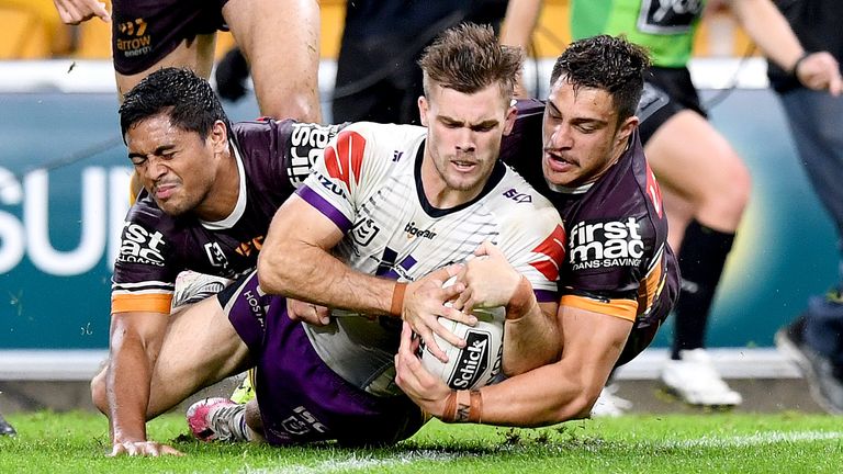 BRISBANE, AUSTRALIA - JULY 24: Ryan Papenhuyzen of the Storm scores a try during the round 11 NRL match between the Brisbane Broncos and the Melbourne Storm at Suncorp Stadium on July 24, 2020 in Brisbane, Australia. (Photo by Bradley Kanaris/Getty Images)