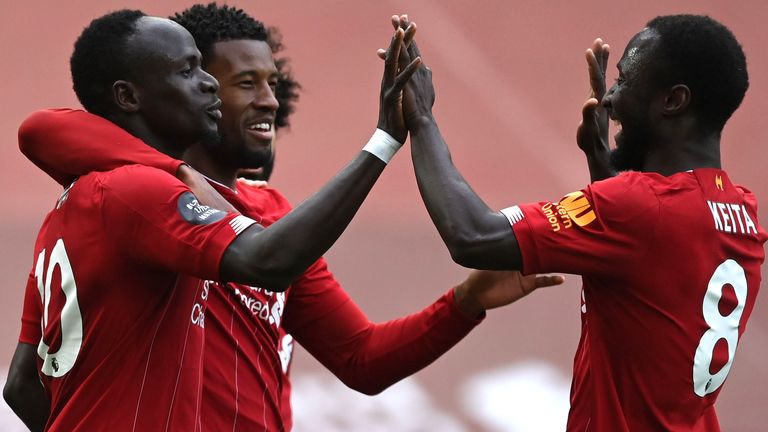 Sadio Mane celebrates after opening the scoring for Liverpool against Aston Villa