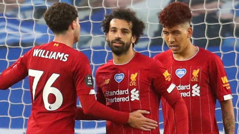 BRIGHTON, ENGLAND - JULY 08: Mohamed Salah of Liverpool celebrates after scoring his teams first goal during the Premier League match between Brighton & Hove Albion and Liverpool FC at American Express Community Stadium on July 08, 2020 in Brighton, England.