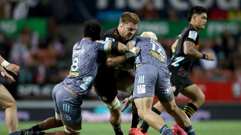 Sam Cane takes on the Chiefs defence