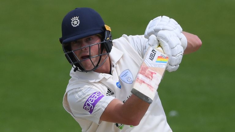 HOVE, ENGLAND - JULY 28: Sam Northeast of Hampshire in action as wicketkeeper Ben Brown of Sussex looks on during a friendly match between Sussex and Hampshire at County Ground on July 28, 2020 in Hove, England.