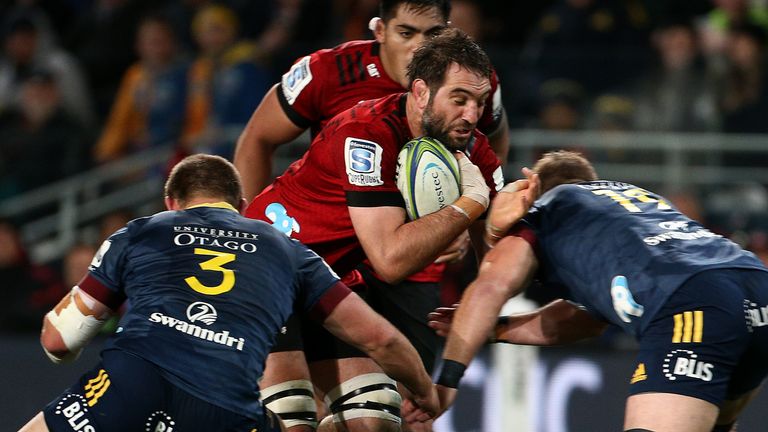 Sam Whitelock runs into contact