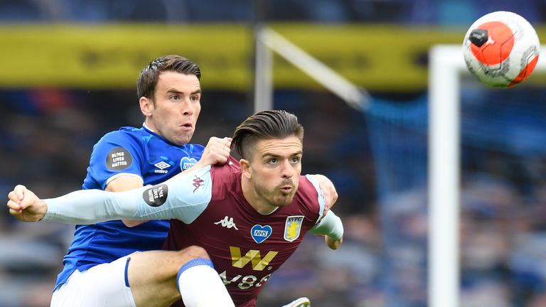 Everton defender Seamus Coleman vies with Aston Villa midfielder Jack Grealish