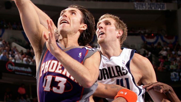 Steve Nash stretches for a lay-up beyond the reach of Dirk Nowitzki
