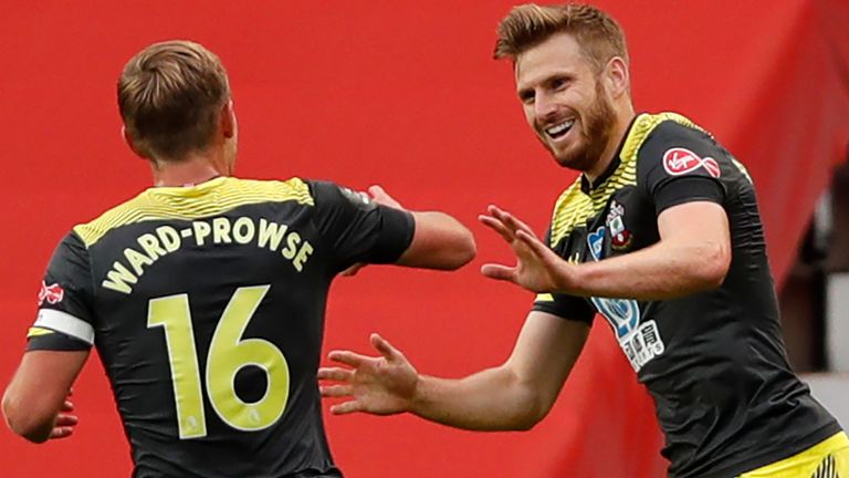 Stuart Armstrong and James Ward-Prowse celebrate after the former gave Southampton the lead at Old Trafford