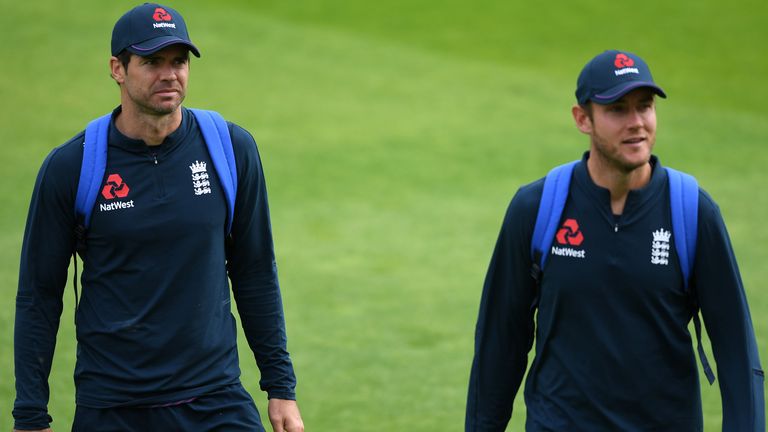 MANCHESTER, ENGLAND - JULY 23: James Anderson (L) and Stuart Broad (R) of England walk across the outfield during a England Nets Session at Emirates Old Trafford on July 23, 2020 in Manchester, England. (Photo by Gareth Copley/Getty Images)