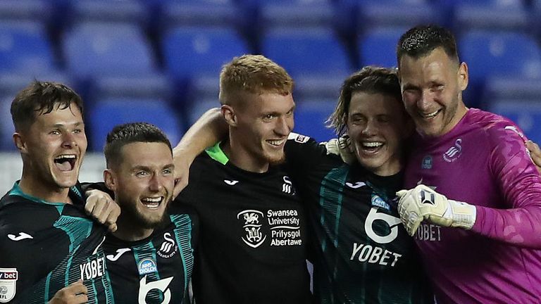 Swansea celebrate after reaching the Championsip play-offs