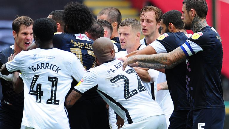 Players from both Swansea and Luton clashed during the Championship match between the two sides