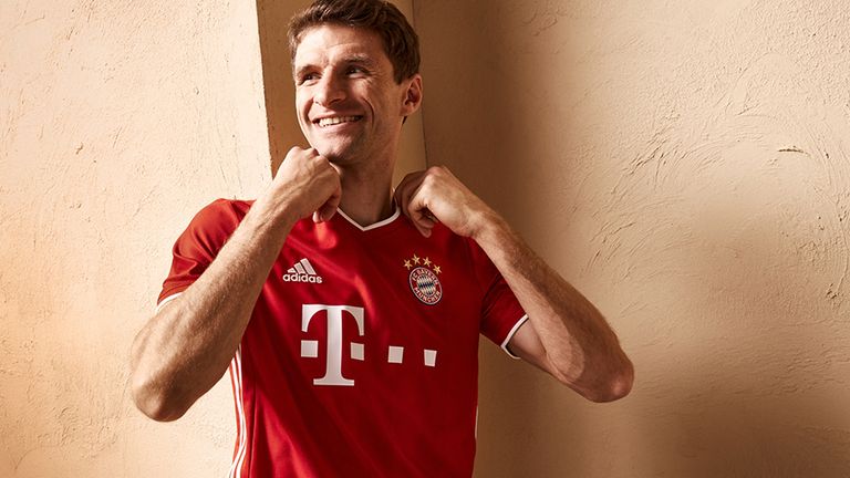 Thomas Muller sports Bayern Munich's new home kit 