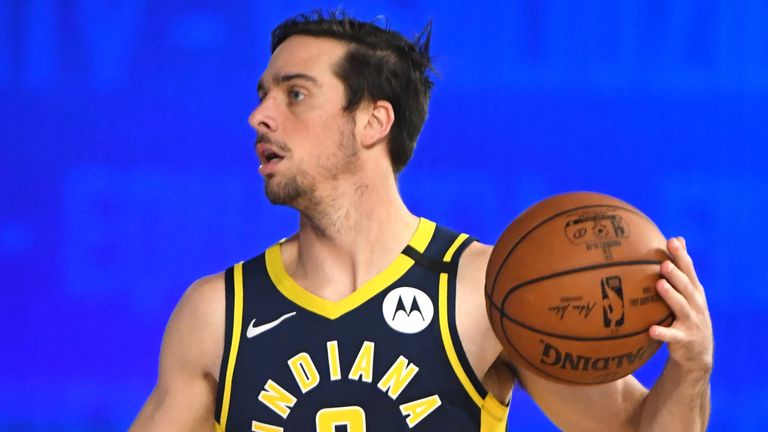 TJ McConnell controls possession for the Indiana Pacers in their scrimmage win over the Dallas Mavericks