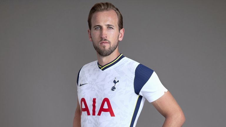 Harry Kane models the new Tottenham home kit