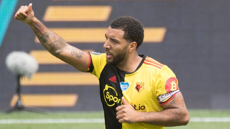 Troy Deeney celebrates scoring for Watford