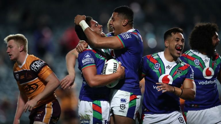 The Warriors celebrates after scoring a try