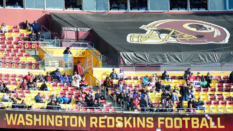 A general view as fans sit in the stands during the first half of a game between the New York Giants and Washington Redskins