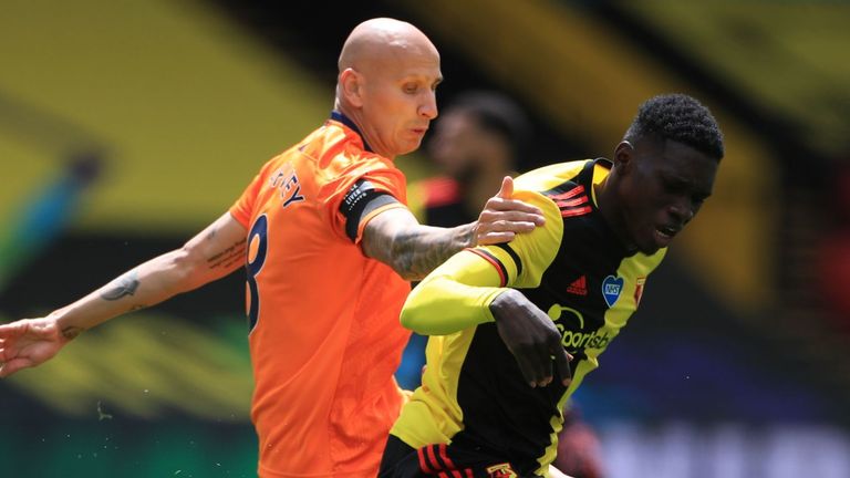 Watford's Ismaila Sarr and Newcastle Jonjo Shelvey battle for the ball
