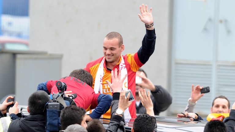 Dutch football player Wesley Sneijder is welcomed by Galatarasay supporters after his arrival at Ataturk airport on January 21, 2013. Dutch midfielder Wesley Sneijder said Monday he was "very happy" to put his protracted departure from Inter Milan behind him as he left Serie A for Turkish giants Galatasaray on Monday