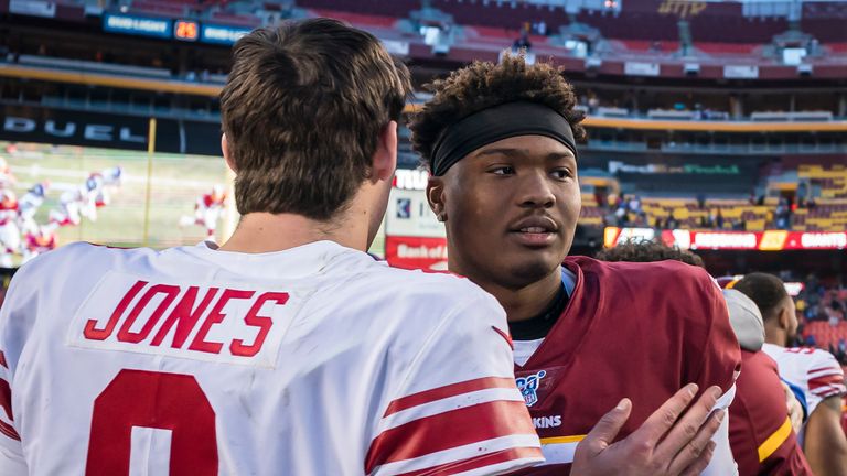 Daniel Jones of the New York Giants speaks with Dwayne Haskins of the Washington Redskins