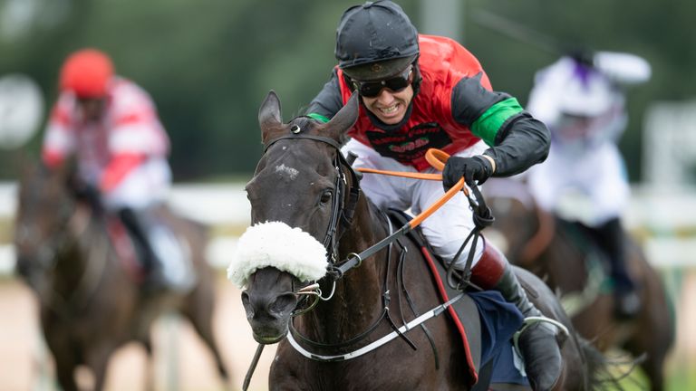 Hunters Call ridden by Richard Johnson go on to win thesignsolutions.org Handicap Hurdle at Southwell Racecourse