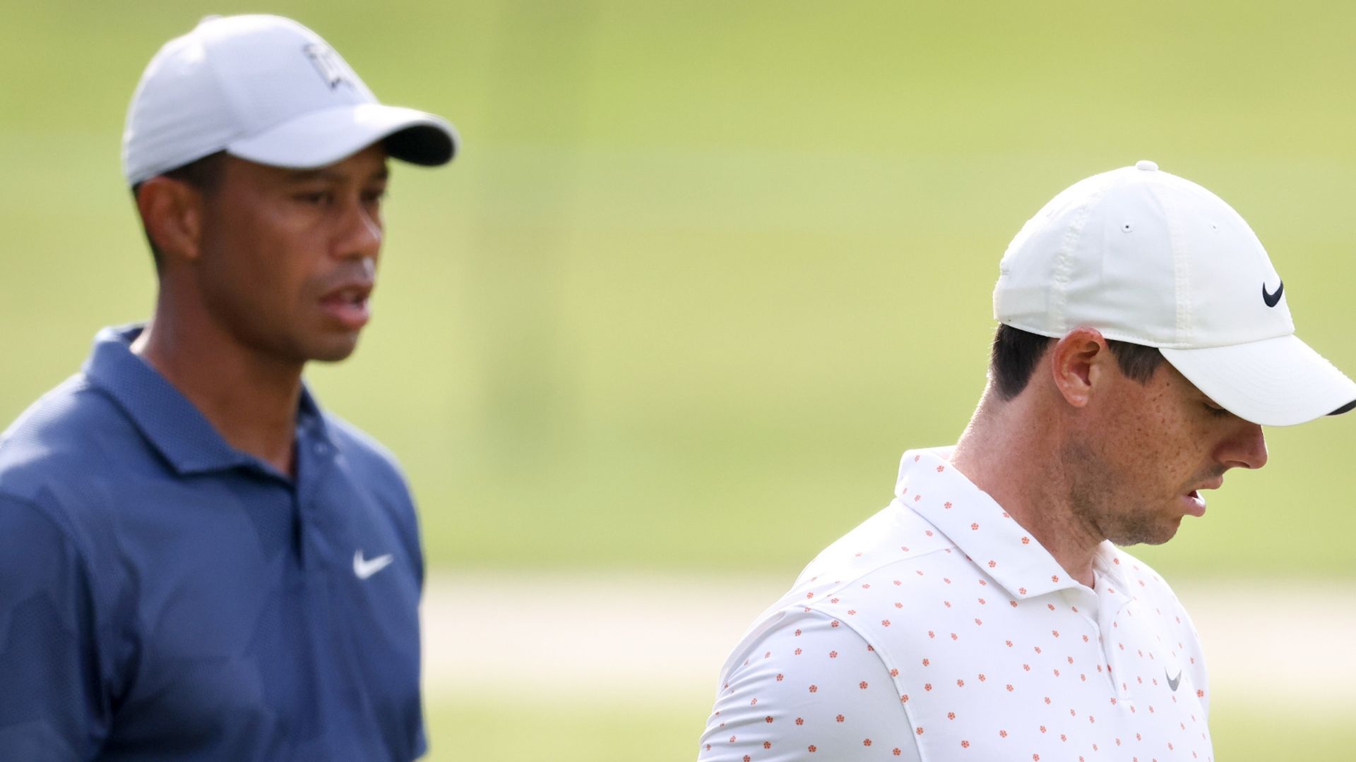 Tiger beats Rory but both struggle