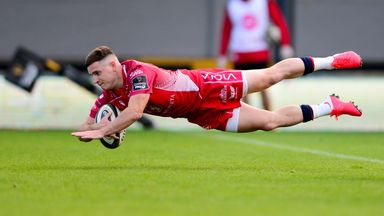 Dane Blacker scores a try for Scarlets