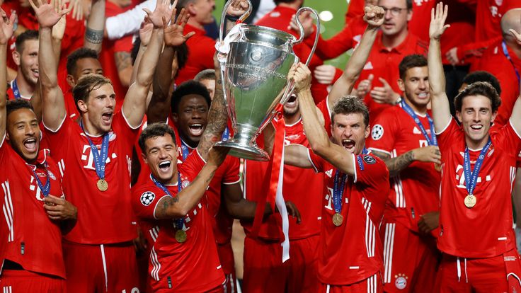 Bayern Munich players celebrate with the trophy