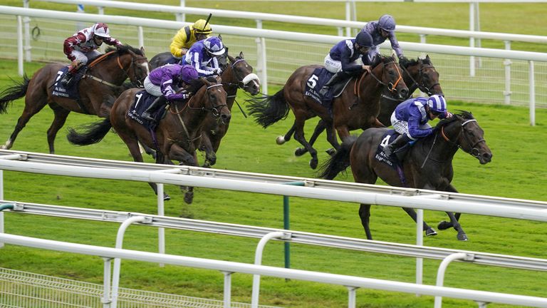 Jim Crowley on board Minzaal (right) on their way to winning the The Al Basti Equiworld Dubai Gimcrack Stakes during day three of the Yorkshire Ebor Festival at York Racecourse.