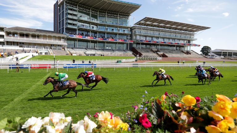 Miss Amulet ridden by James Doyle (left) wins the Sky Bet Lowther Stakes