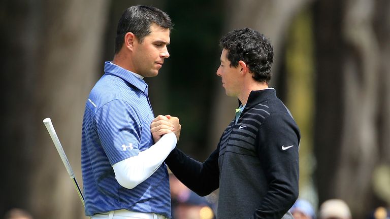 Gary Woodland congratulates McIlroy after losing out in the final