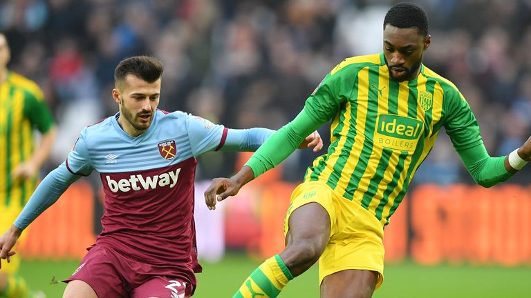 West Ham striker Albian Ajeti (L) and West Bromwich Albion defender Semi Ajayi in action in their FA Cup tie at the London Stadium